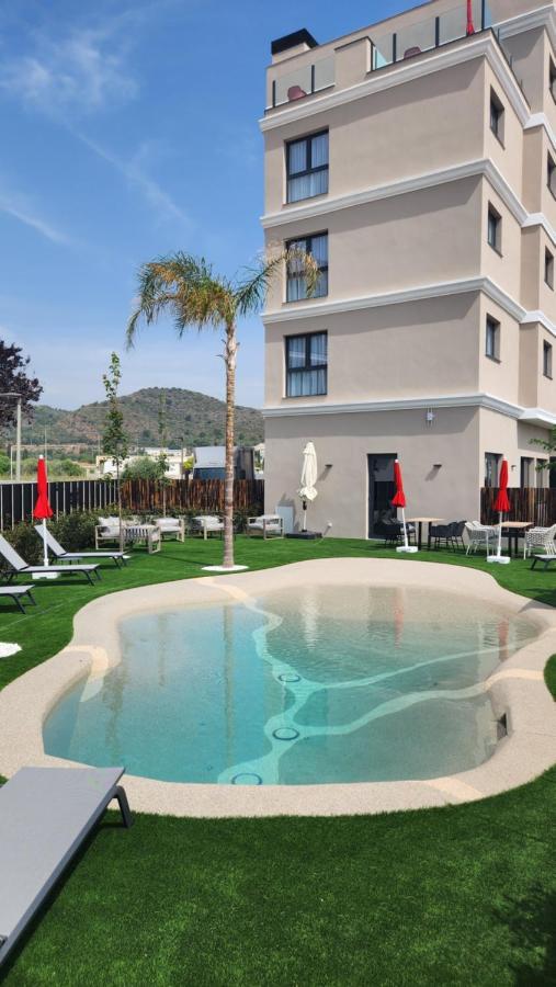 Sercotel Plana Suites Vall de Uxó Esterno foto